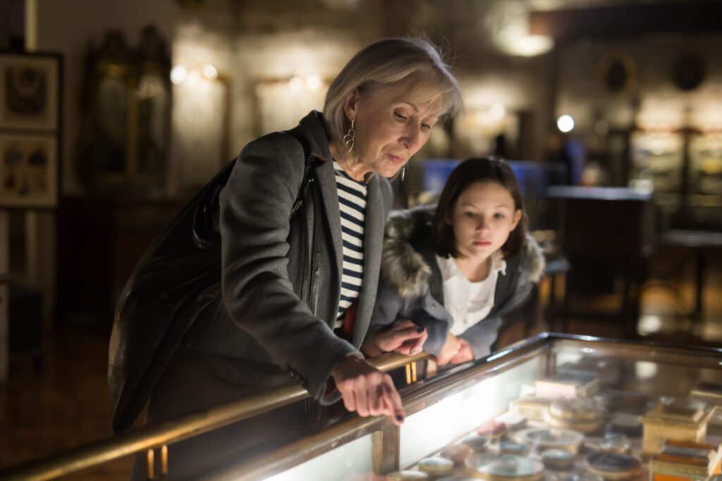 grandparent and grandchild in museum