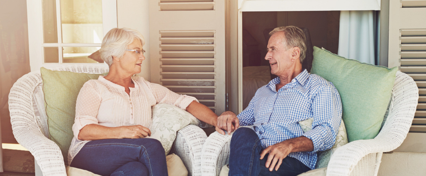 older couple sitting and talking