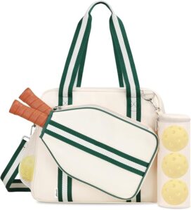 A cream and green sports bag set with two rackets in an external pocket and a transparent container holding three yellow pickleballs attached to the side.