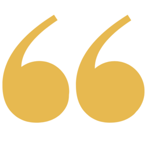 Large, gold quotation marks on a light grey background.