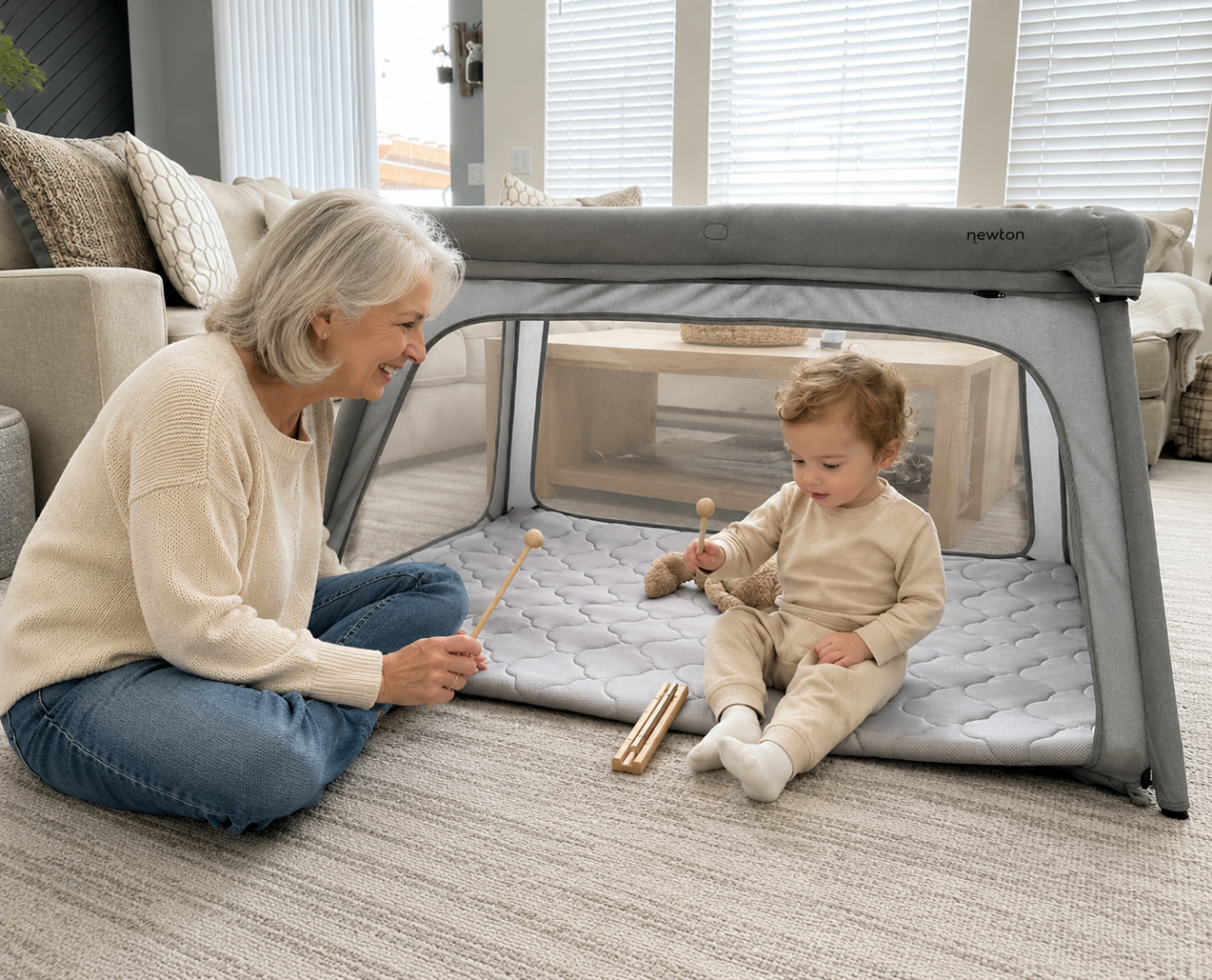 ZestYears product tester using Newton Compact Travel Crib and Playard