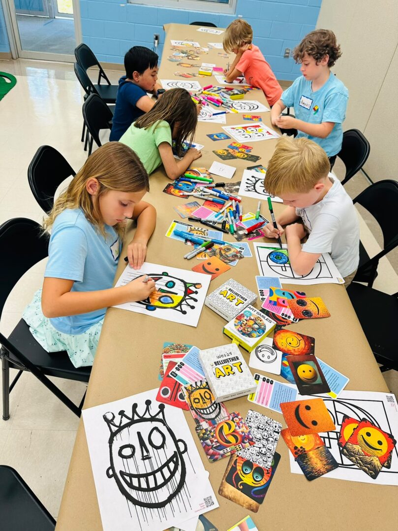 Child playing with Art Smiles cards